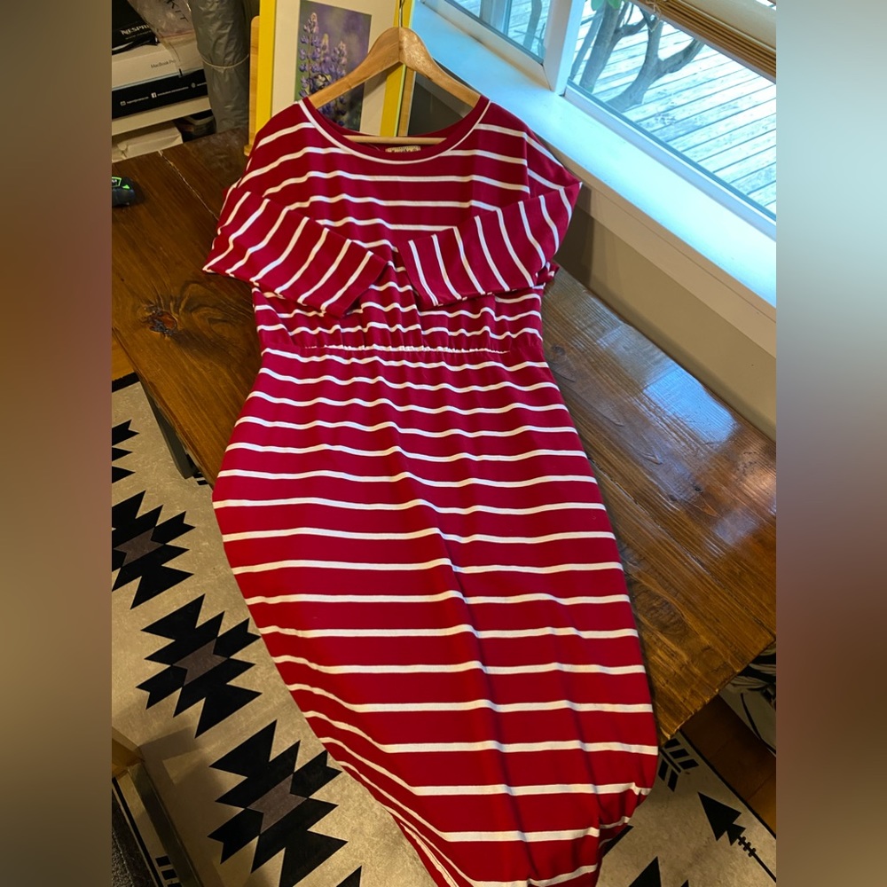 Stretchy knee length red dress with white stripes. Has pockets!